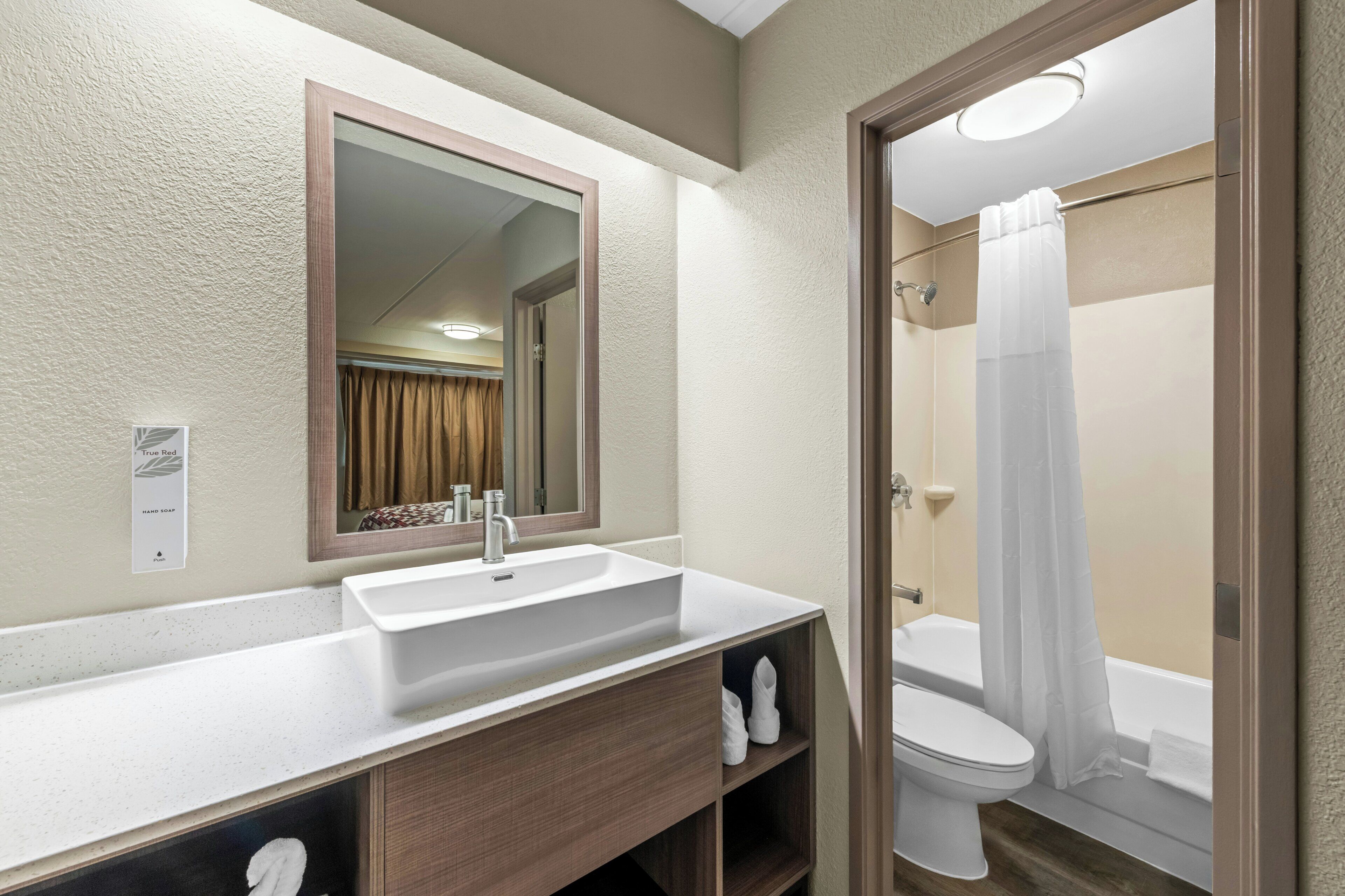 Hair dryer, towels, soap, shampoo