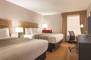 Individually furnished, desk, laptop workspace, blackout drapes