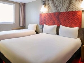 Premium bedding, desk, blackout drapes, soundproofing
