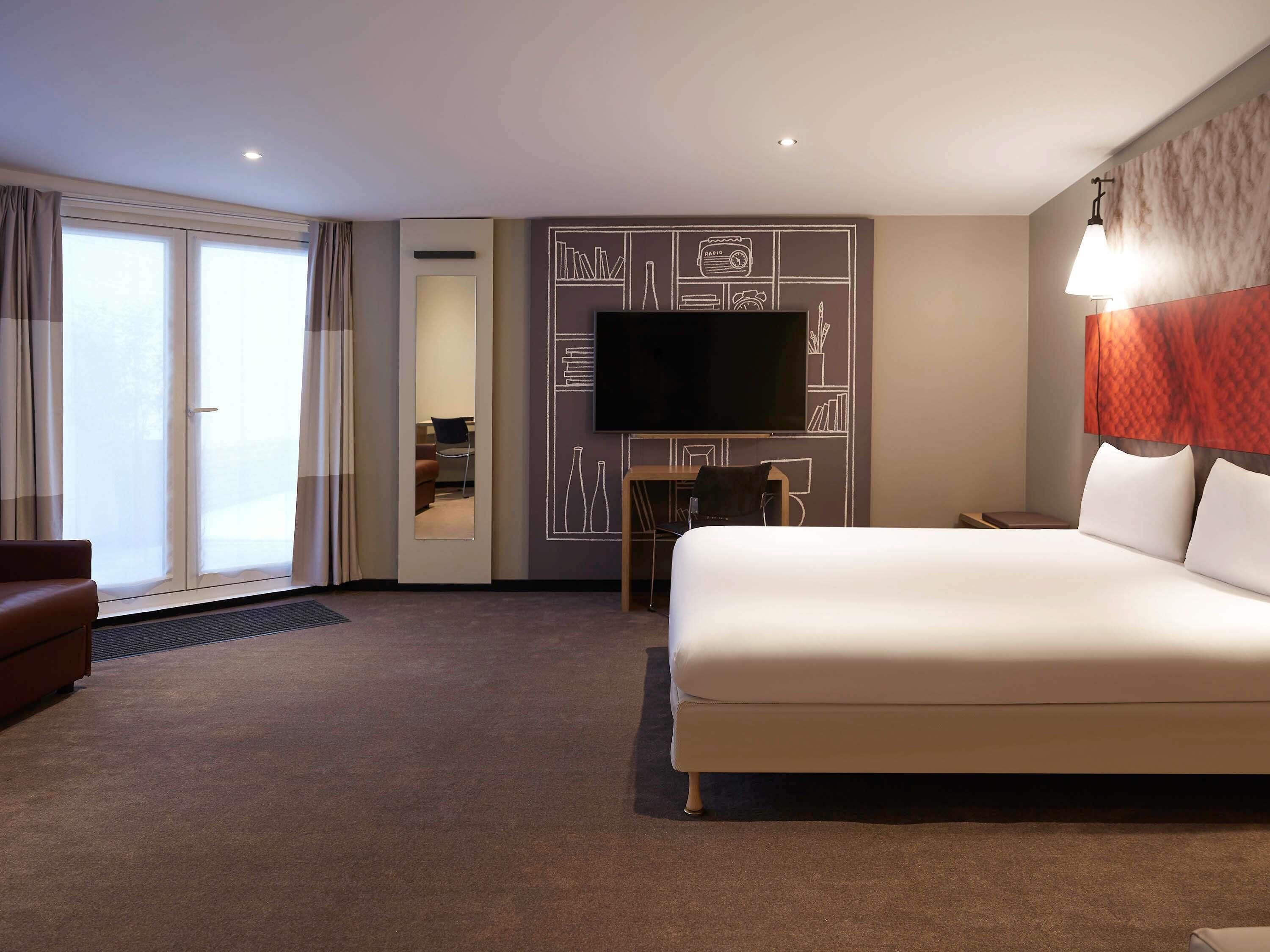 Premium bedding, desk, blackout curtains, soundproofing