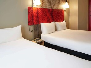 Premium bedding, desk, blackout drapes, soundproofing