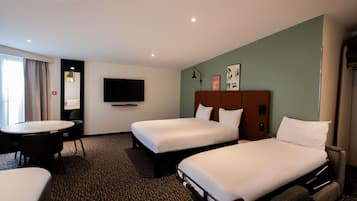 Premium bedding, desk, blackout drapes, soundproofing