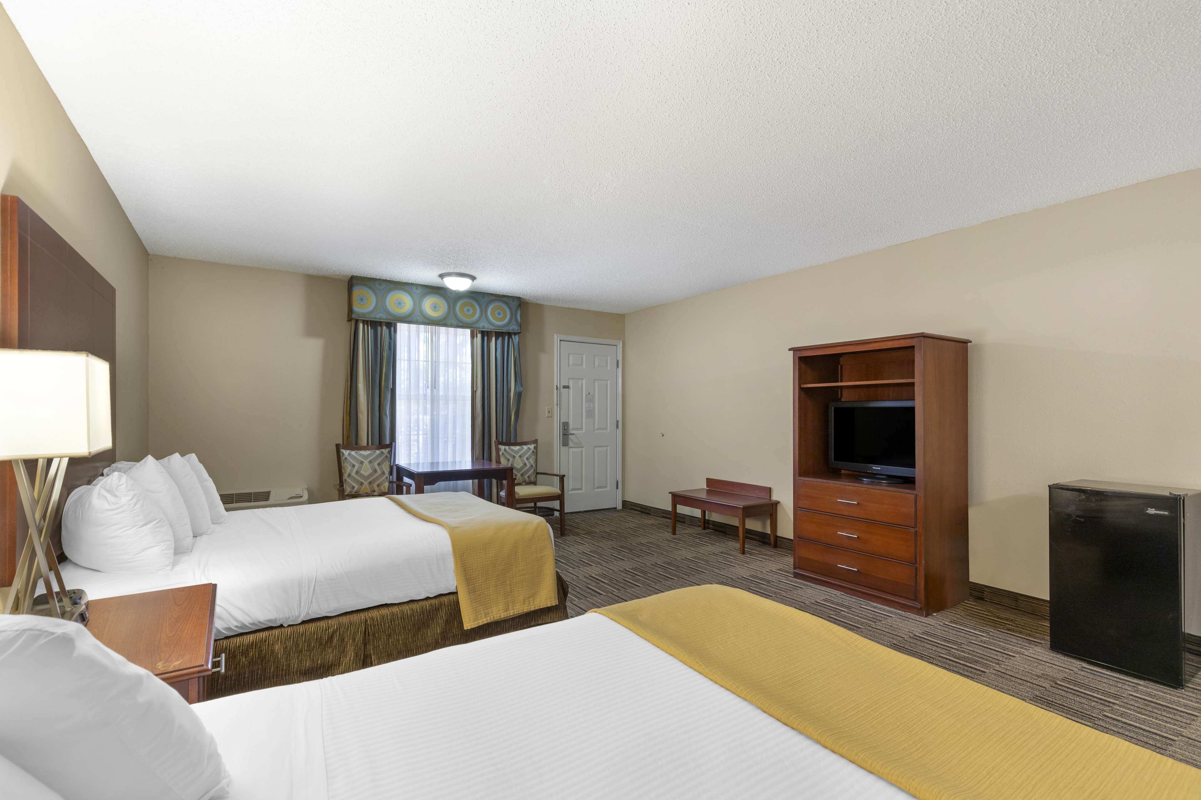 premium bedding, desk, laptop workspace, iron/ironing board