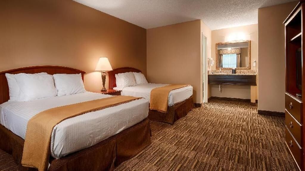Premium bedding, desk, laptop workspace, iron/ironing board