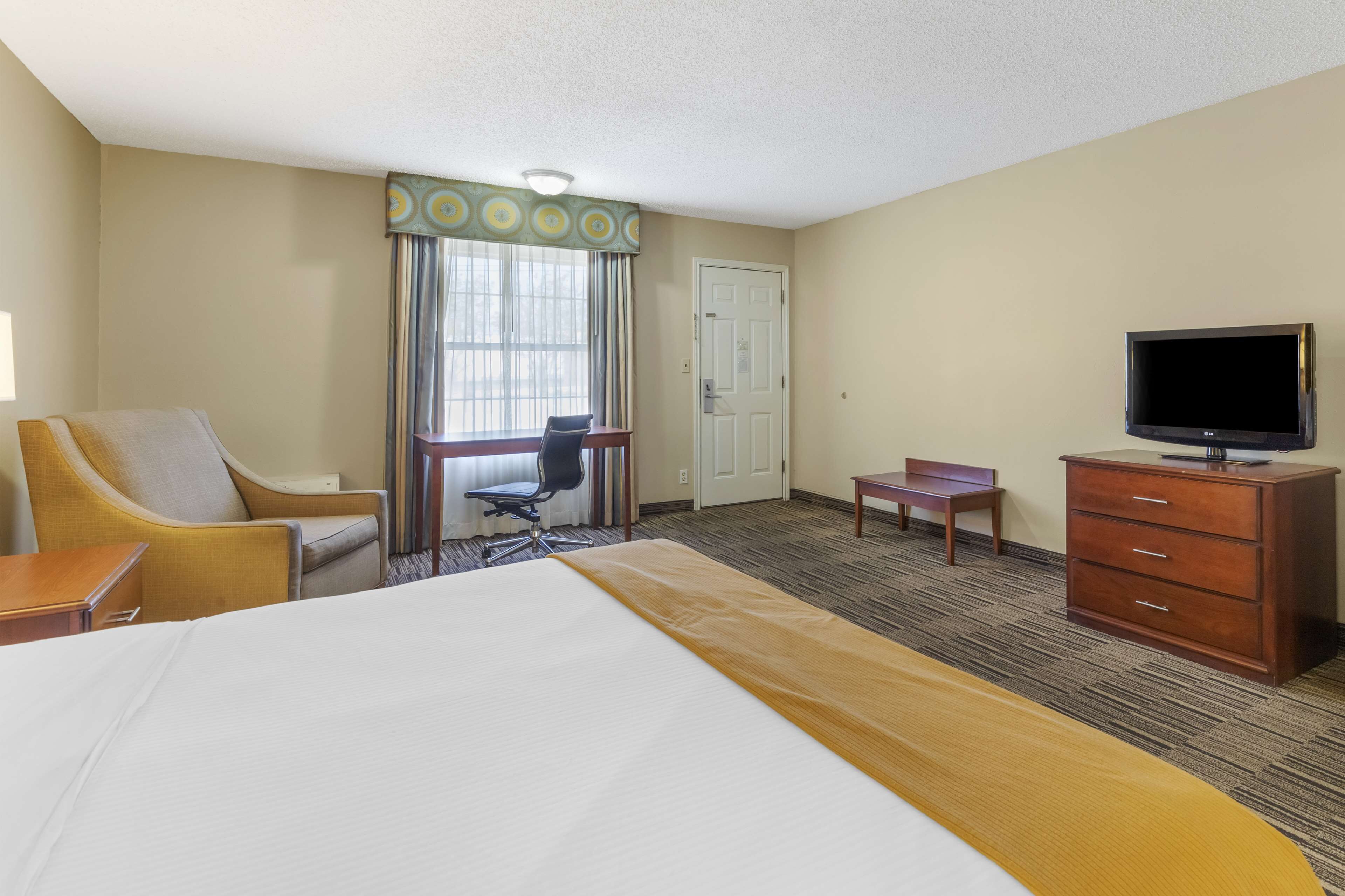 premium bedding, desk, laptop workspace, iron/ironing board