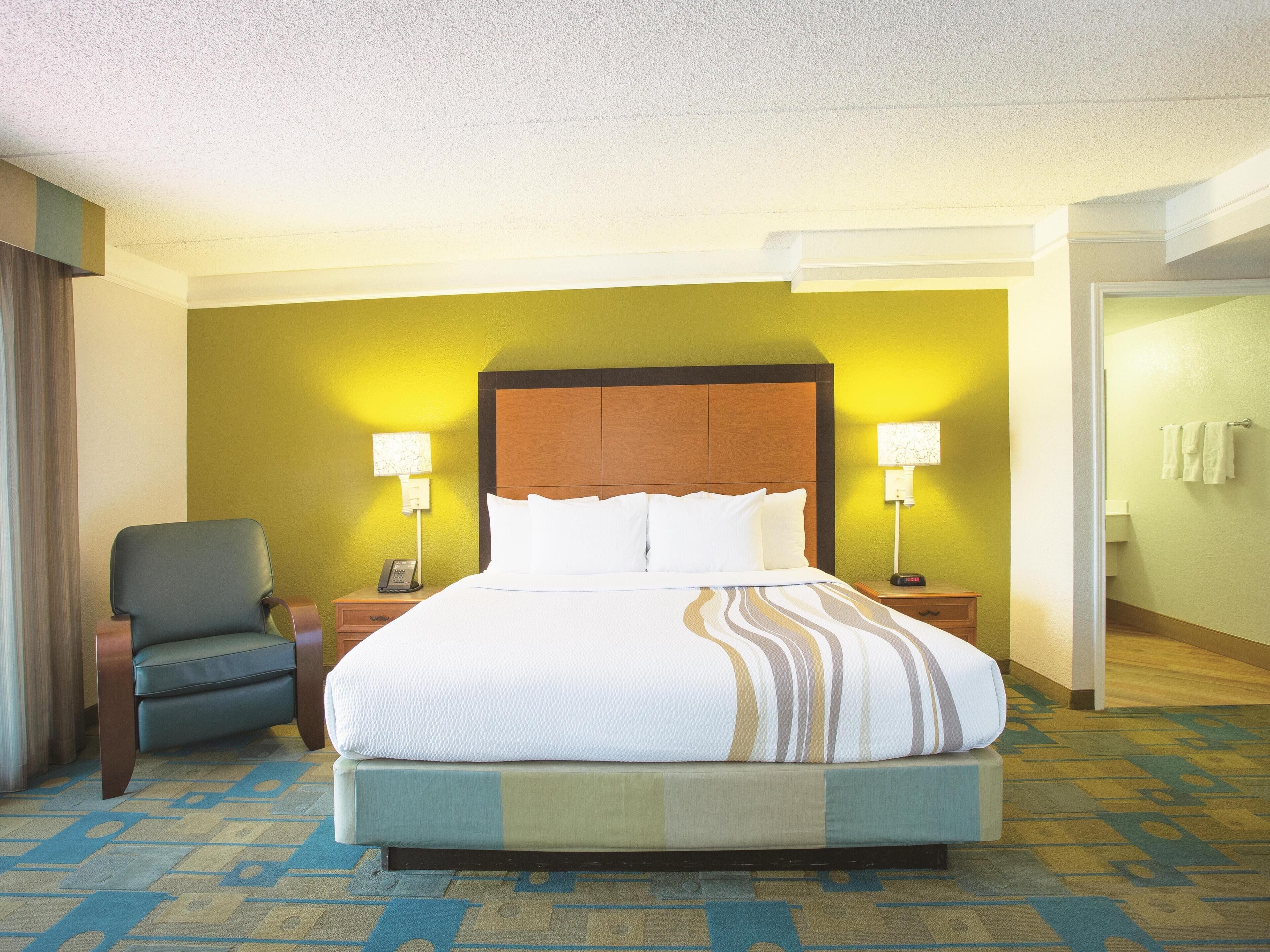 Suite, 1 King Bed, Non Smoking | Premium bedding, desk, iron/ironing board, free cots/infant beds