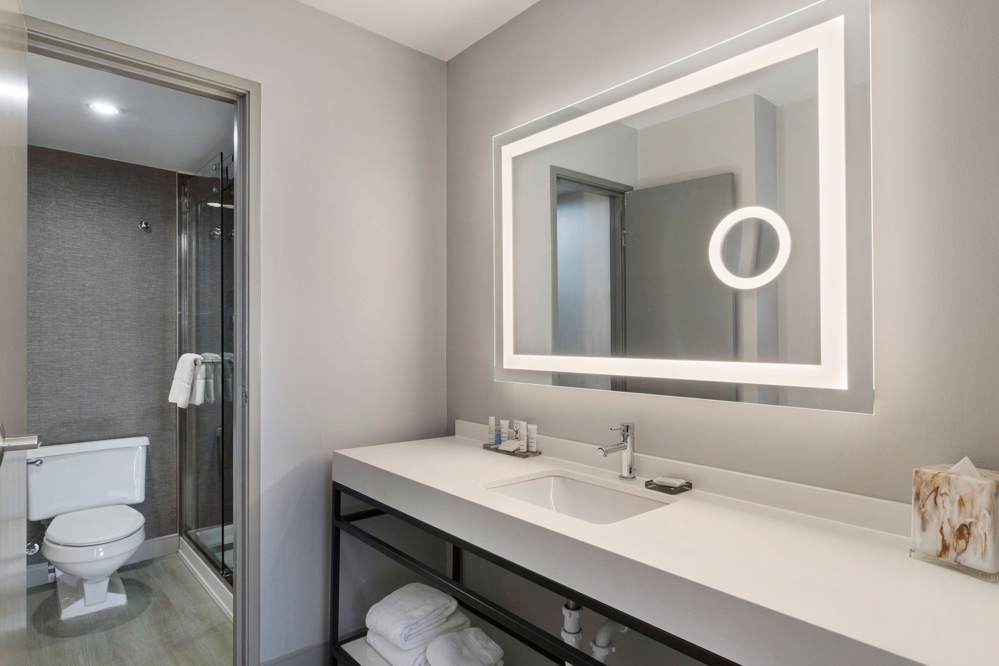 room, 1 king bed | bathroom | shower, designer toiletries, hair dryer, towels