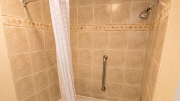 Standard Room, 1 King Bed, Non Smoking | Bathroom | Combined shower/tub, free toiletries, hair dryer, towels