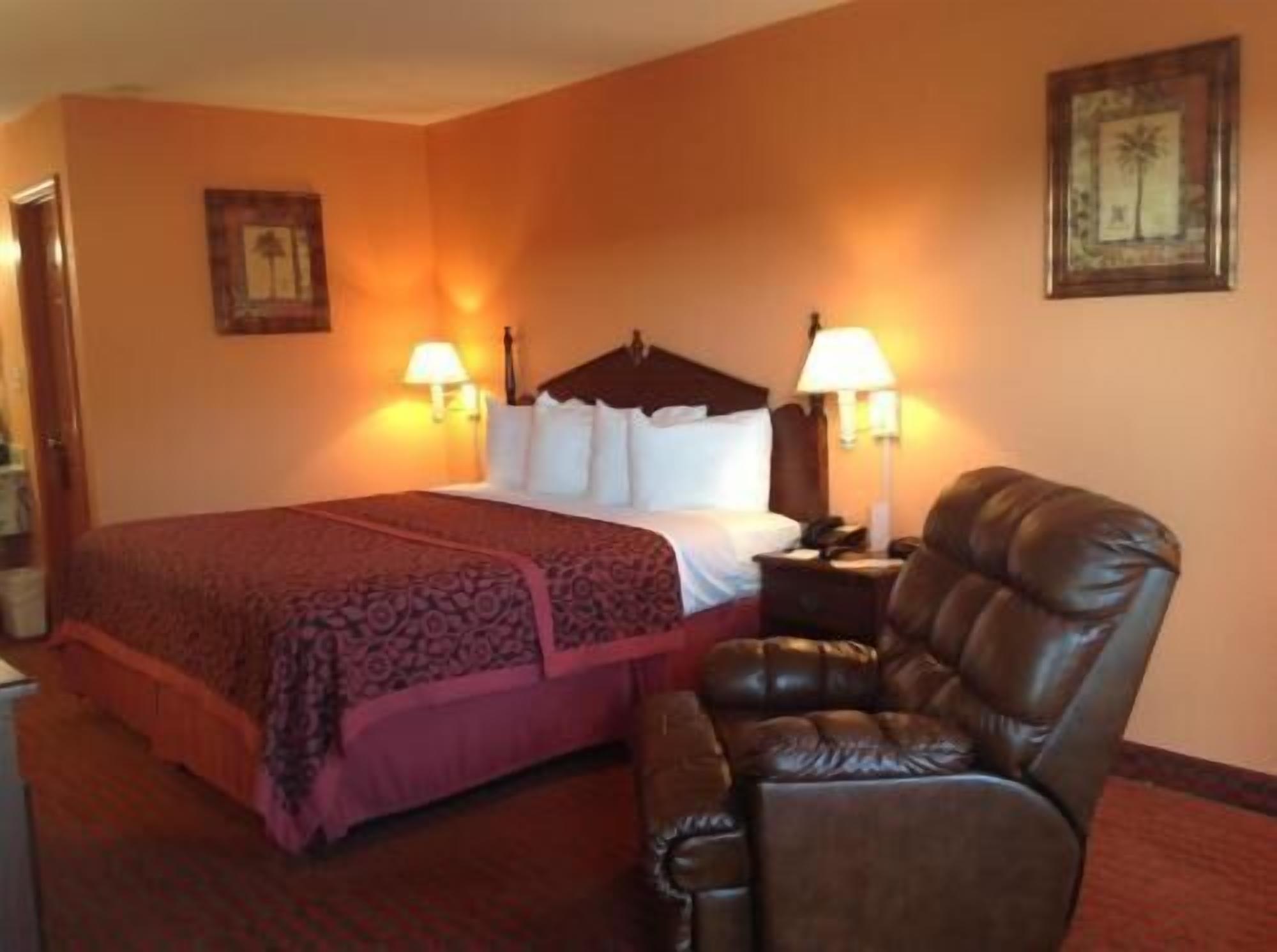 Premium bedding, desk, laptop workspace, blackout drapes
