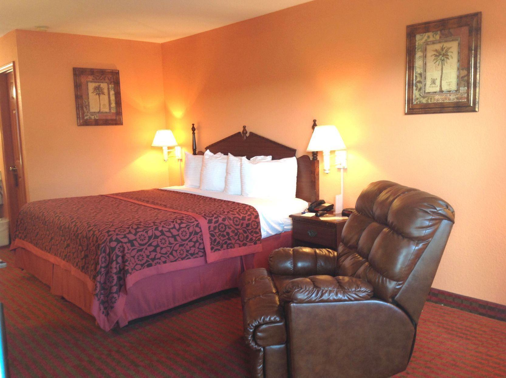Premium bedding, desk, laptop workspace, blackout drapes