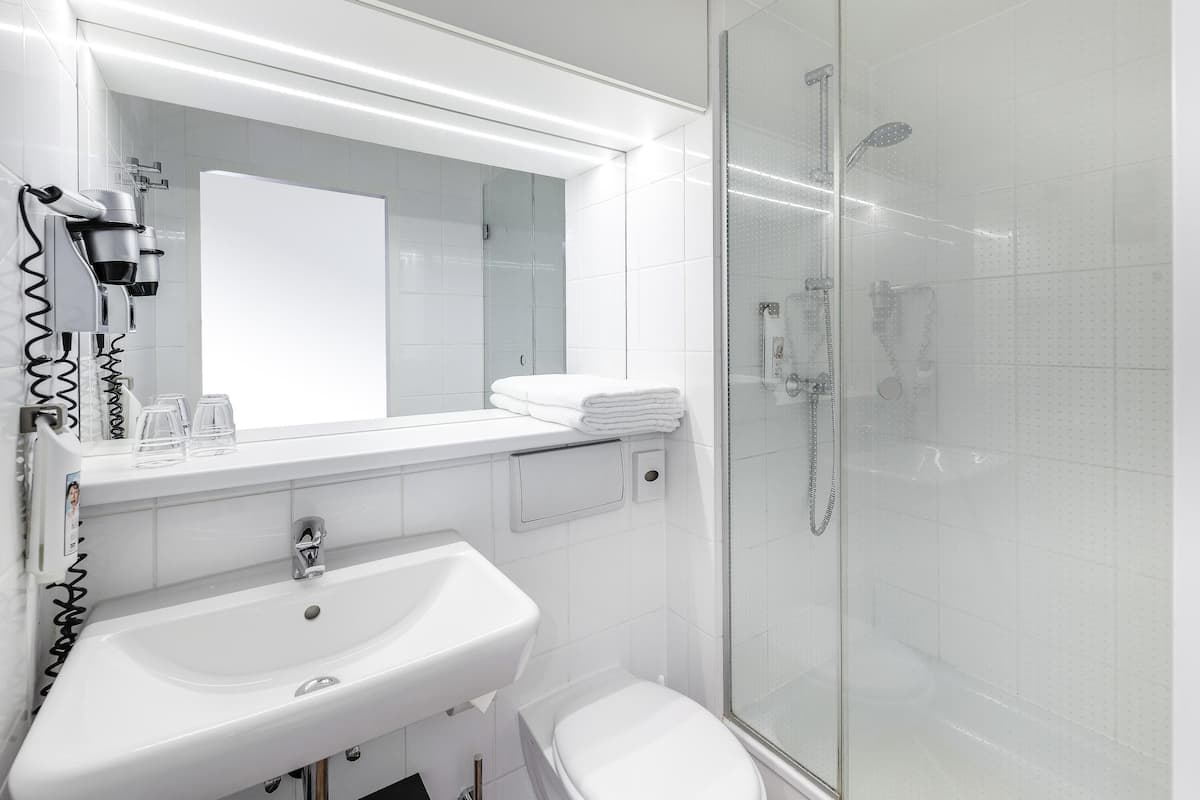 Hypo-allergenic bedding, pillowtop beds, desk, blackout drapes