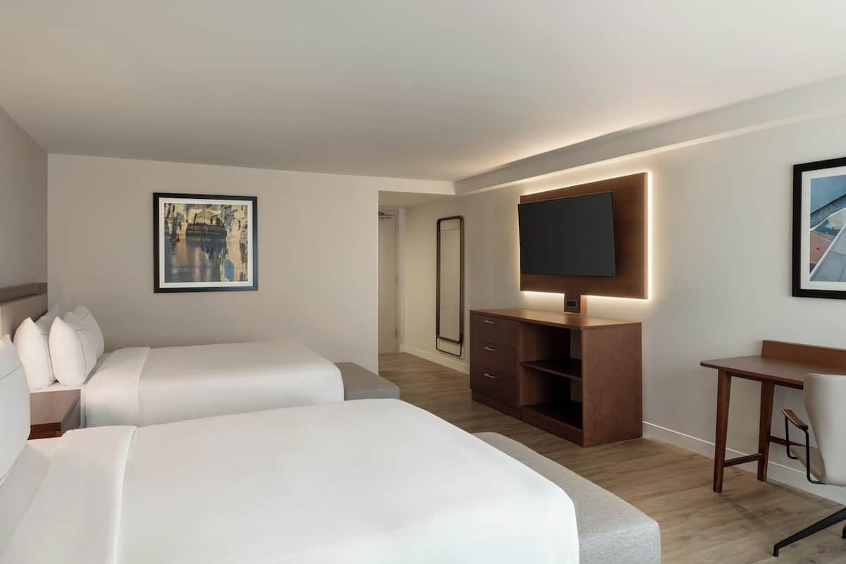 Premium bedding, desk, laptop workspace, iron/ironing board
