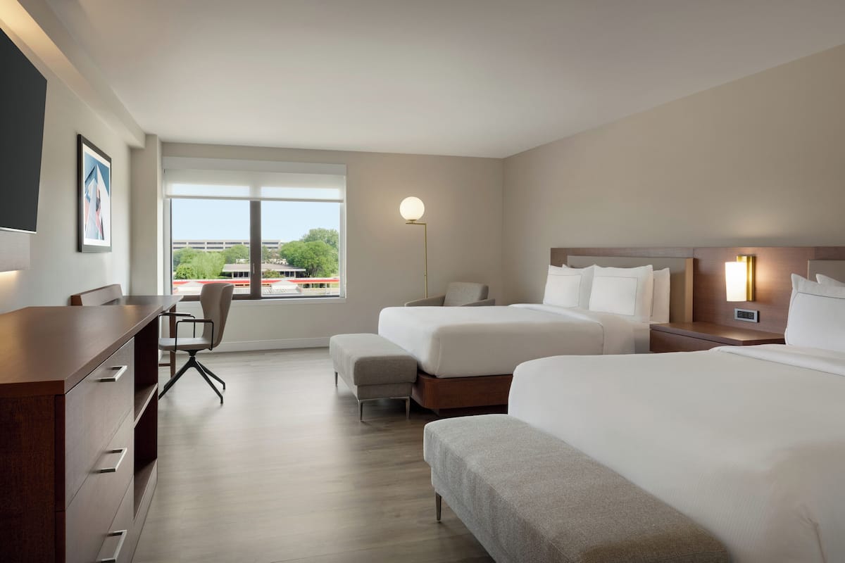 Premium bedding, desk, laptop workspace, iron/ironing board