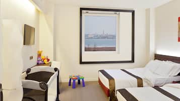 Premium bedding, down comforters, minibar, in-room safe
