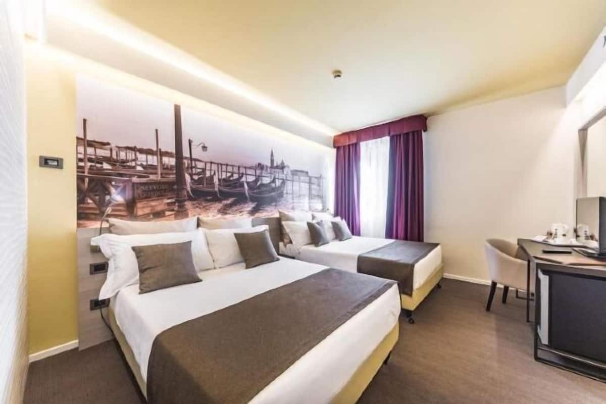 Premium bedding, down comforters, minibar, in-room safe