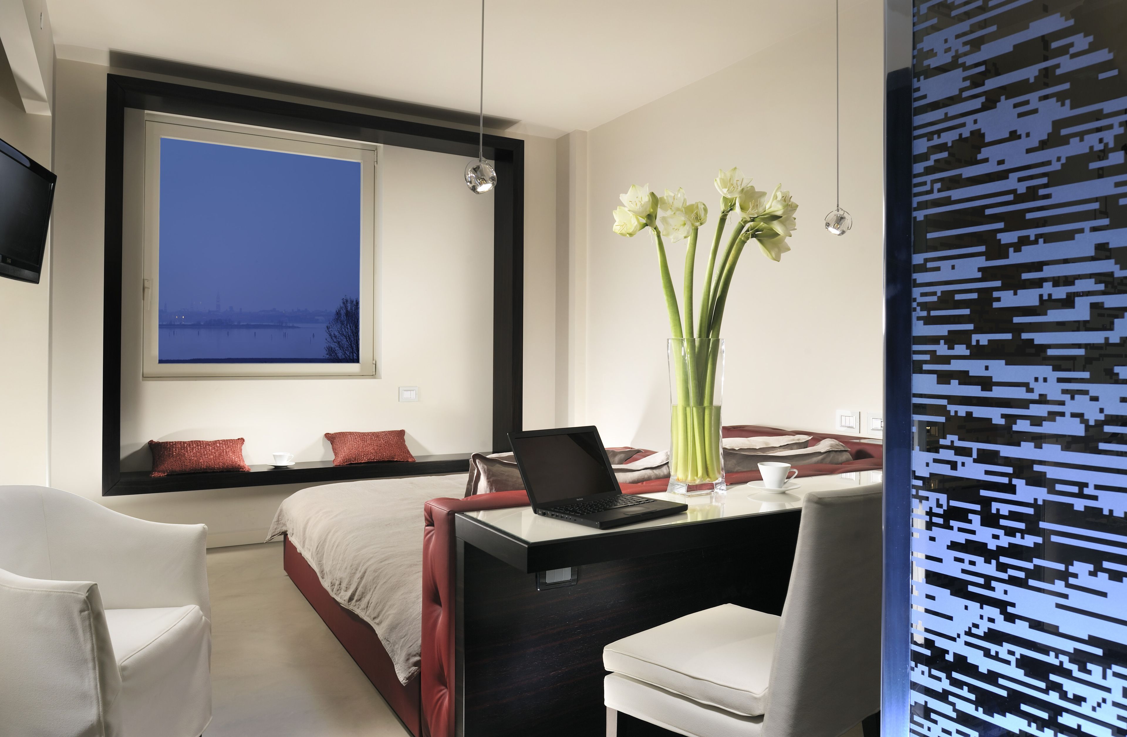 premium bedding, down duvets, minibar, in-room safe