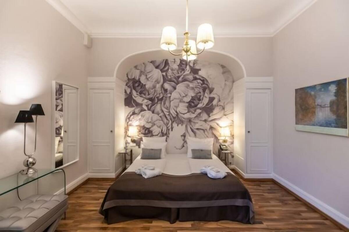 Hypoallergeen beddengoed, een gratis minibar, een bureau