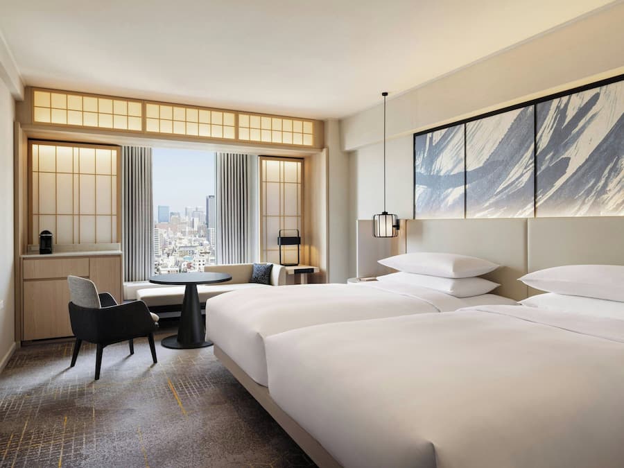 Hypo-allergenic bedding, down comforters, minibar, in-room safe