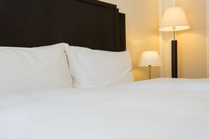 Ropa de cama de alta calidad y minibar 