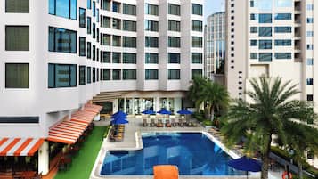 Outdoor pool, open 7:00 AM to 9:00 PM, pool umbrellas, pool loungers