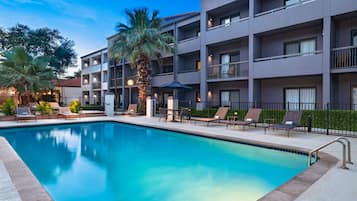 Outdoor pool, open 6:00 AM to 11:00 PM, pool umbrellas, sun loungers