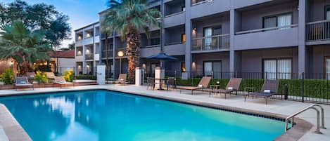 Outdoor pool, open 6:00 AM to 11:00 PM, pool umbrellas, pool loungers