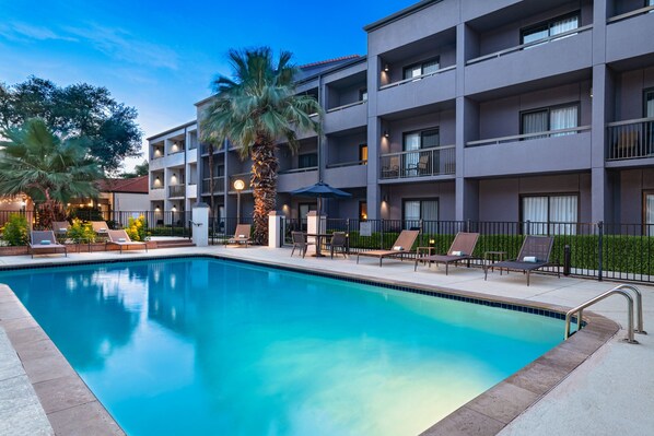 Outdoor pool, open 6:00 AM to 11:00 PM, pool umbrellas, pool loungers