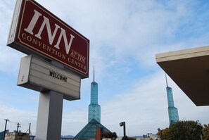 A sign for the INN Convention Center with a welcome message.