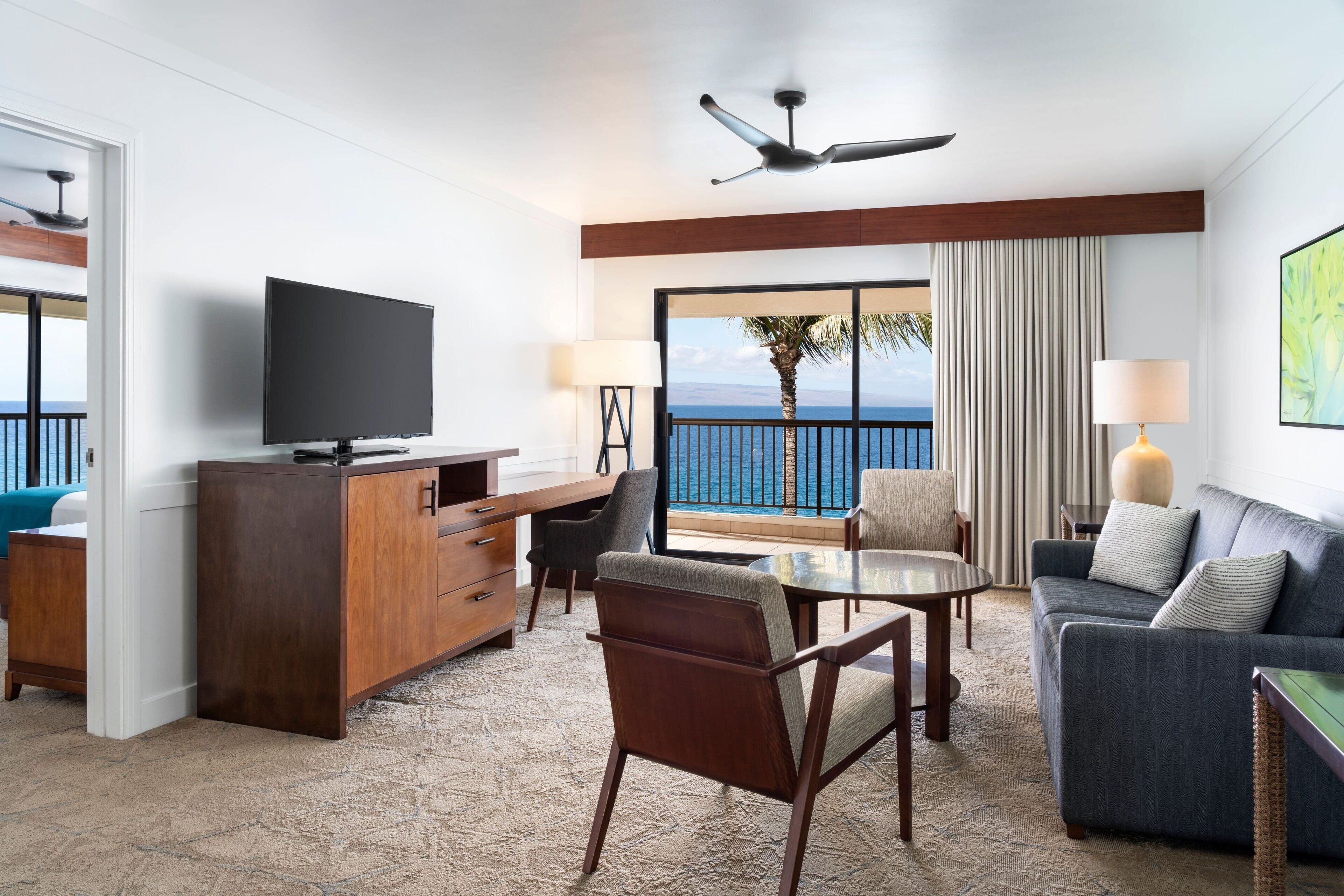 suite, 1 bedroom, non smoking, oceanfront (moana oceanfront) | living room | 50-inch lcd tv with cable channels, tv, table football