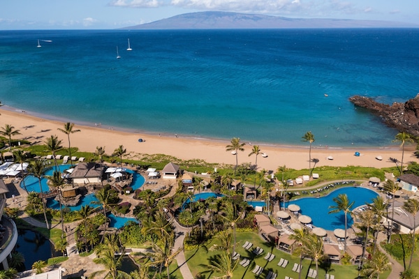 Outdoor pool, open 8:00 AM to 8:00 PM, cabanas (surcharge)
