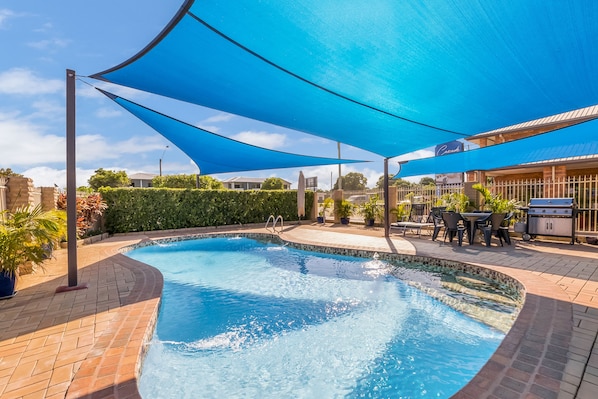 Outdoor pool, pool umbrellas, sun loungers