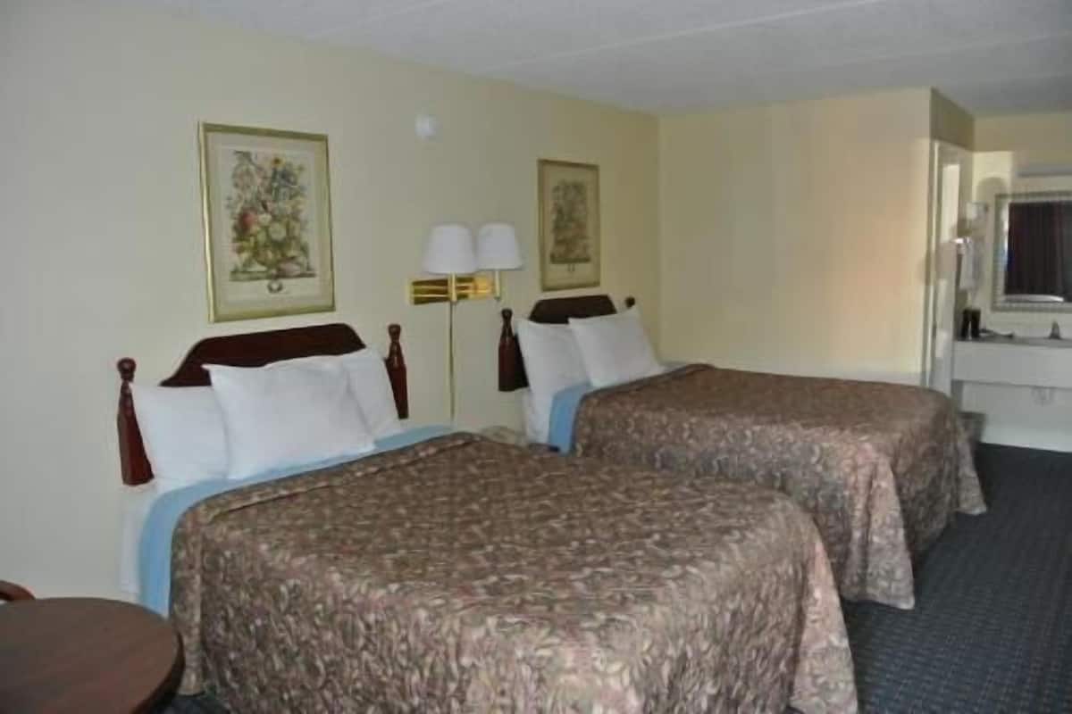Premium bedding, laptop workspace, soundproofing, iron/ironing board