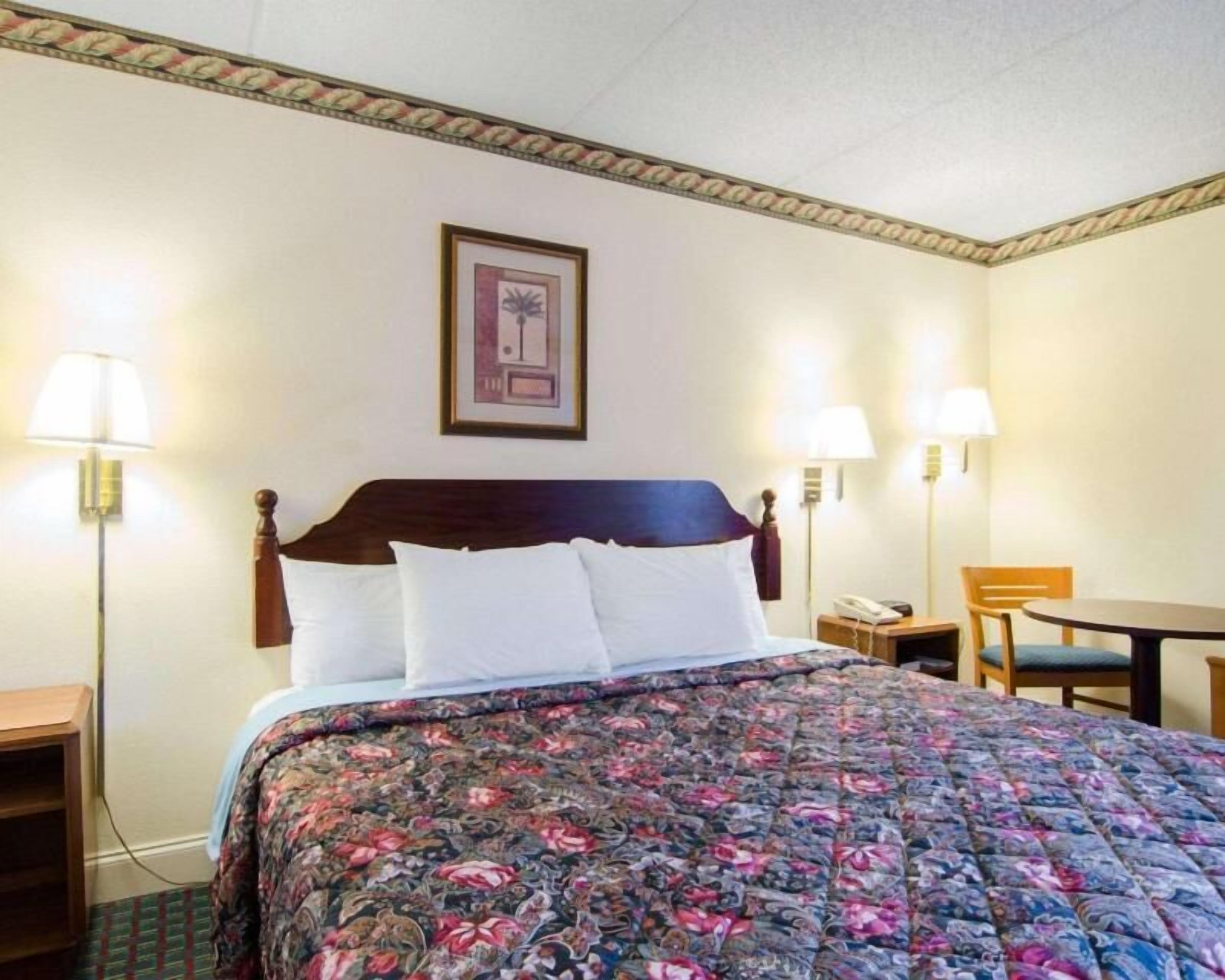 Premium bedding, laptop workspace, soundproofing, iron/ironing board