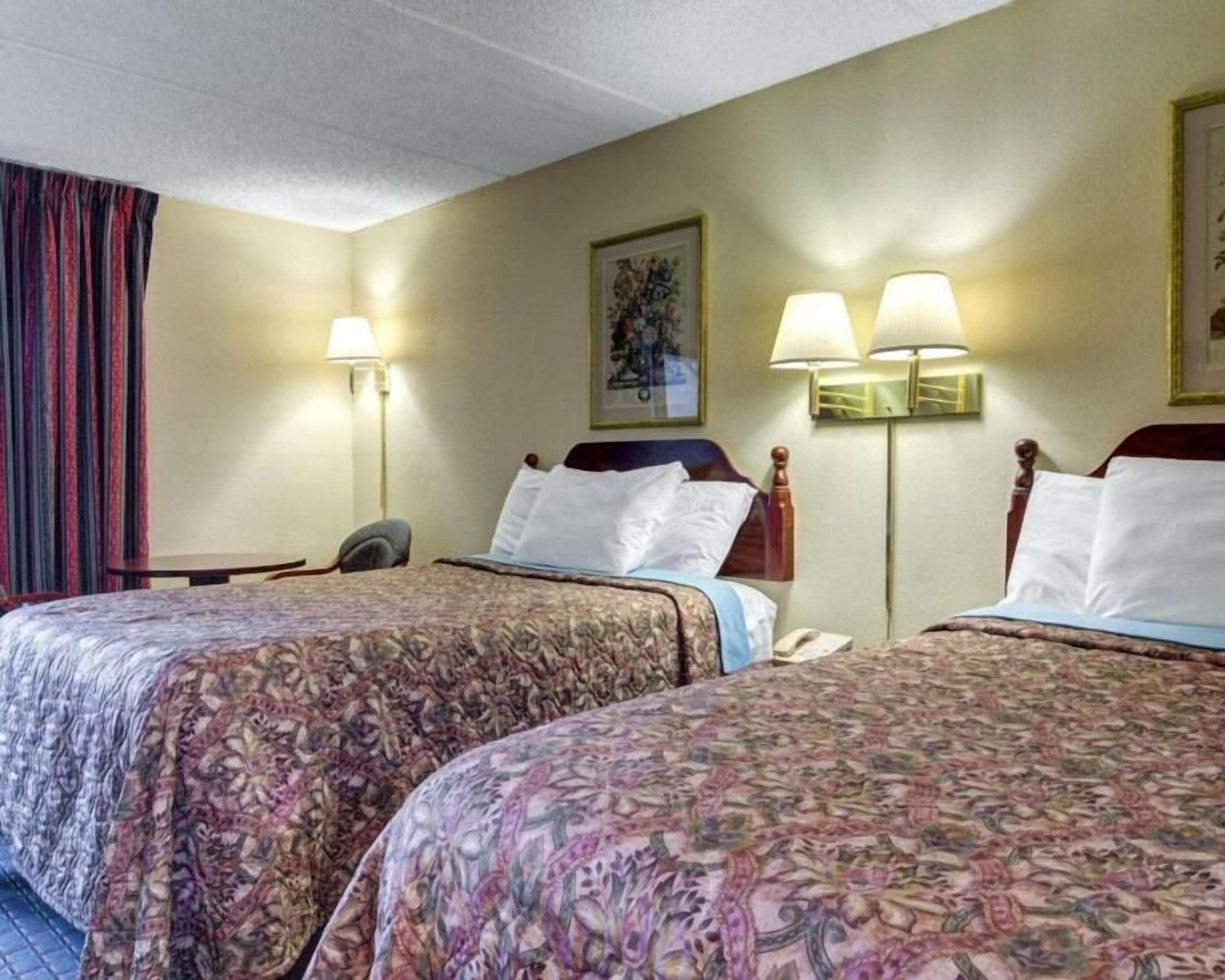 Premium bedding, laptop workspace, soundproofing, iron/ironing board