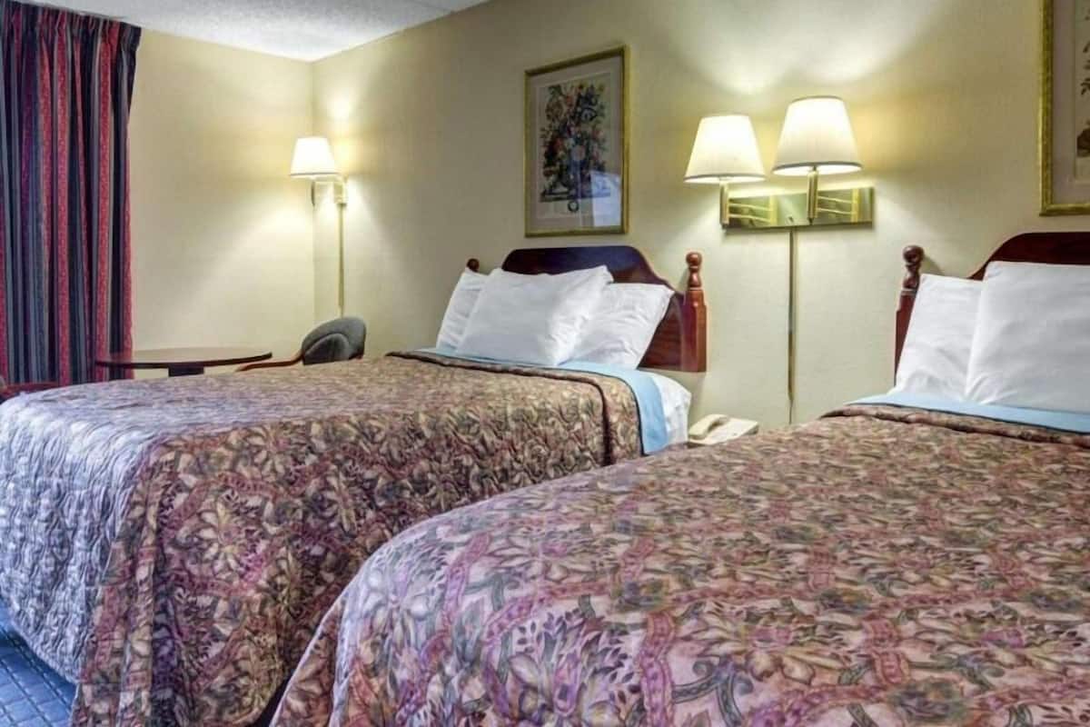 Premium bedding, laptop workspace, soundproofing, iron/ironing board