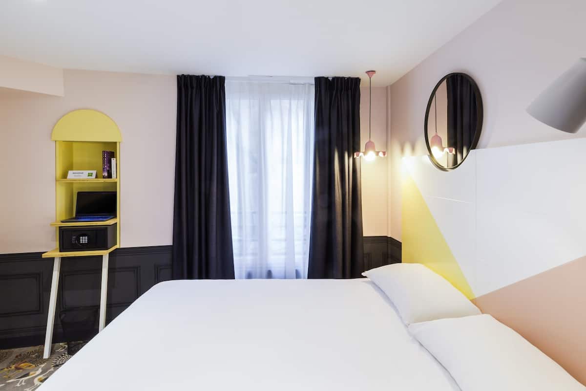 Habitación estándar, 1 cama individual | Ropa de cama de alta calidad y caja de seguridad en la habitación