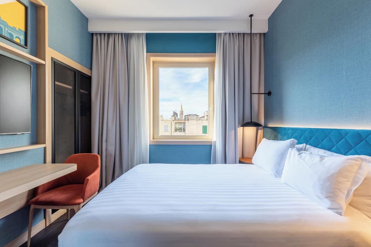 Habitació, 1 llit de matrimoni | Roba de llit d'alta qualitat, minibar i caixa forta a l'habitació