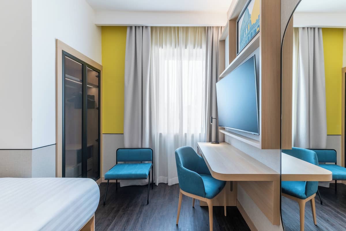 Habitació, 1 llit de matrimoni gran | Roba de llit d'alta qualitat, minibar i caixa forta a l'habitació