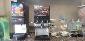 A coffee machine with a Fruit Juice dispenser and a Farmer Brothers coffee station.