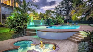 Outdoor pool, open 8:00 AM to 10:00 PM, pool loungers