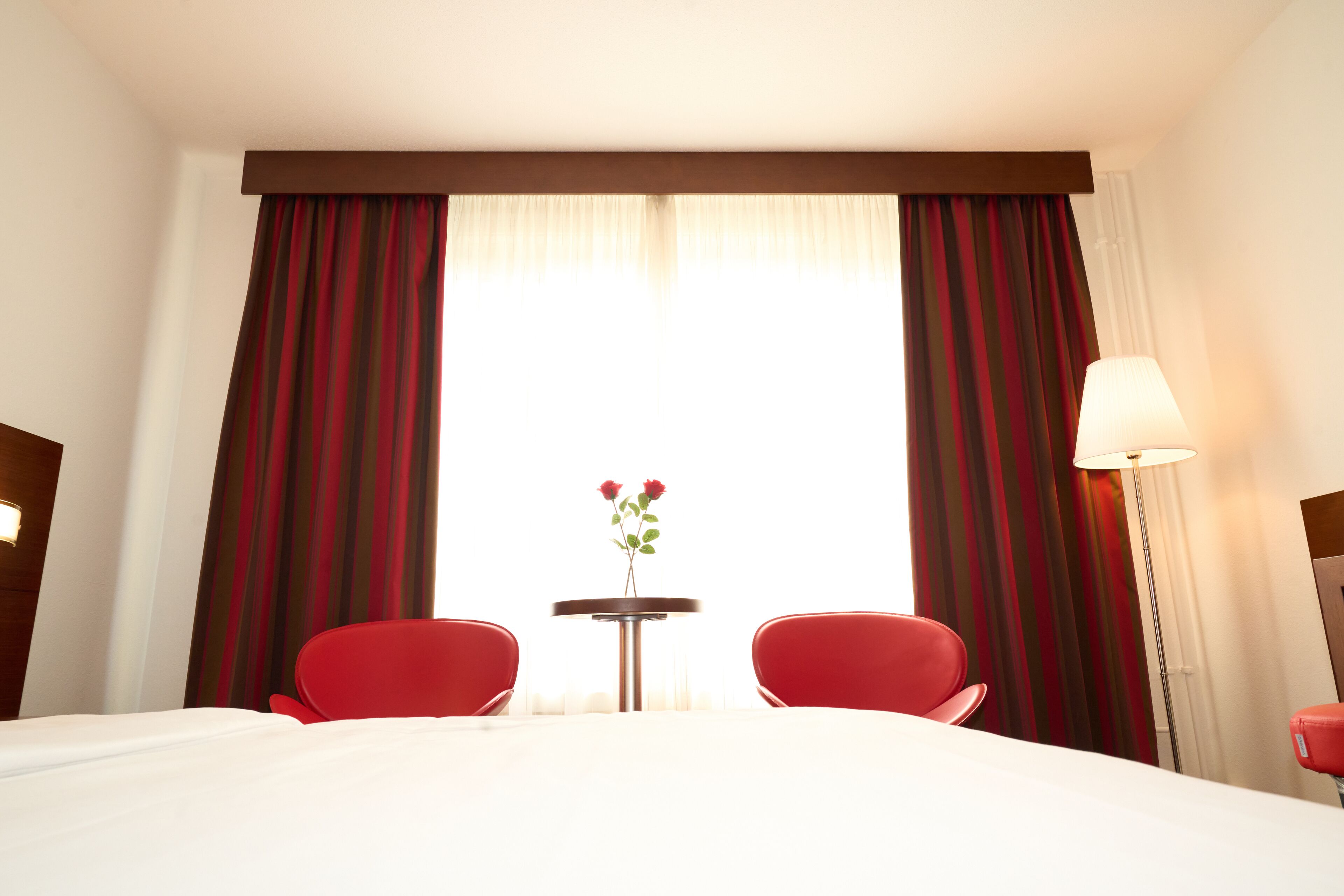 Premium bedding, down comforters, Select Comfort beds, minibar