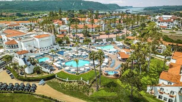 A resort with multiple swimming pools, a golf course, and a view of the surrounding hills. - Omni La Costa Resort & Spa Carlsbad (Carlsbad)