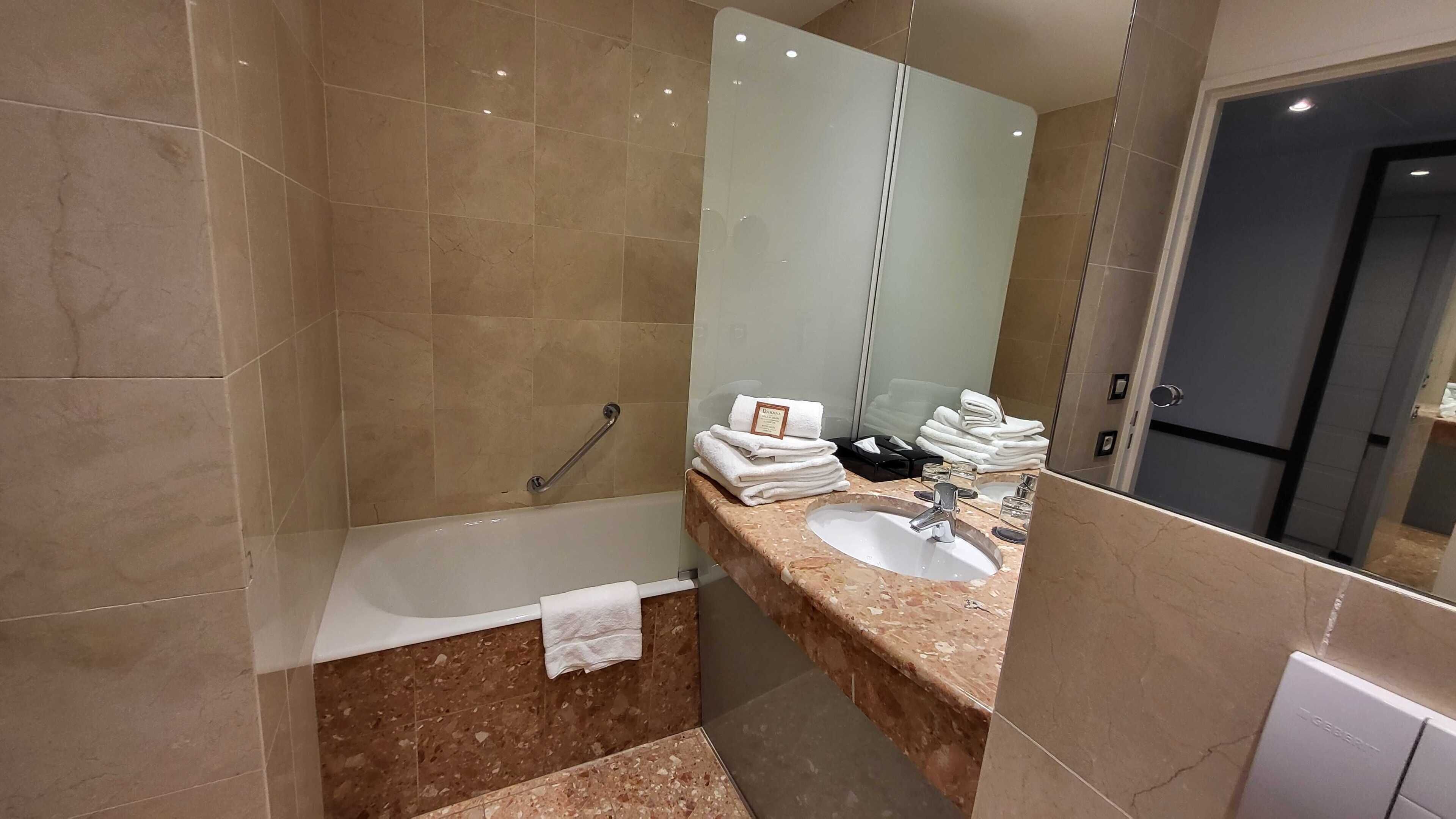 deluxe twin room | bathroom | free toiletries, hair dryer, towels