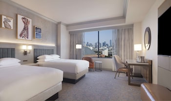 Room, 2 Queen Beds, Accessible, Tower (Mobility, Bathtub) | Living area | 32-inch LCD TV with cable channels, TV, pay movies at  Hilton Anatole