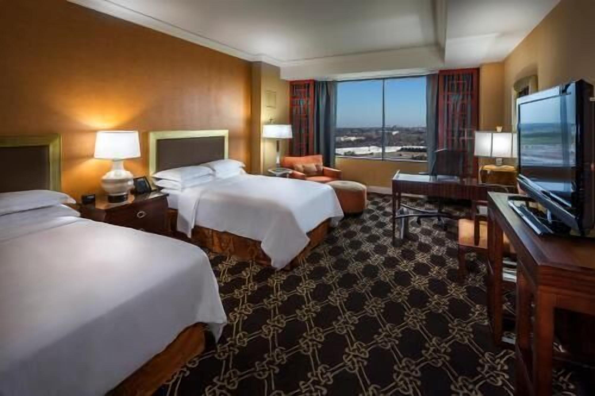 Premium bedding, pillowtop beds, in-room safe, iron/ironing board