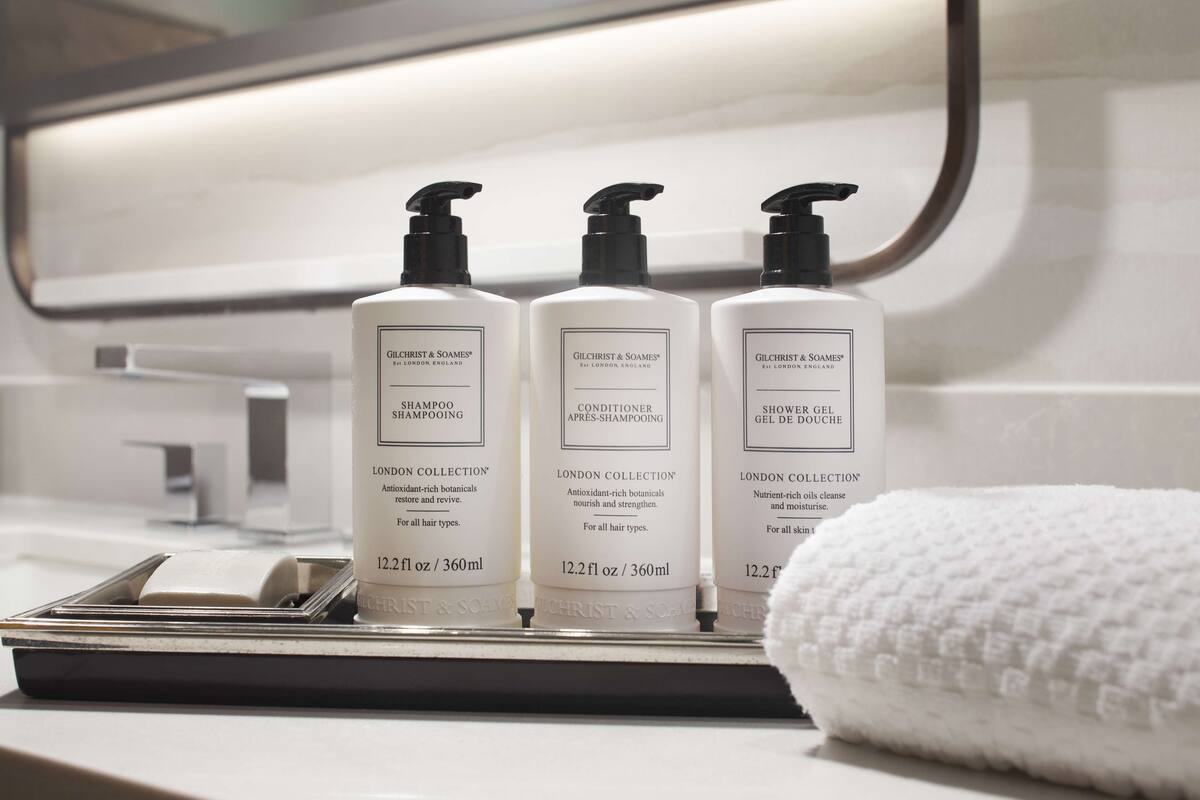 Three Gilchrist & Soames London Collection bottles on a bathroom counter.