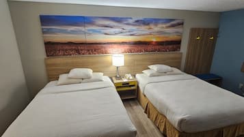 Standard Room, 2 Queen Beds | Desk, iron/ironing board, free cribs/infant beds, free WiFi