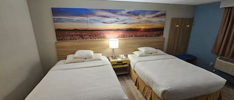 Standard Room, 2 Queen Beds | Desk, iron/ironing board, free cribs/infant beds, free WiFi