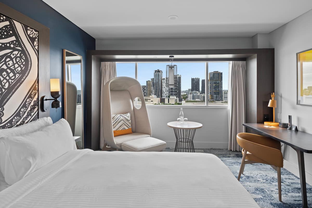 Premium Room, 1 King Bed, River View | 1 bedroom, minibar, in-room safe, desk