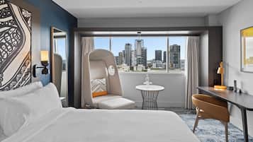 Premium Room, 1 King Bed, River View | Minibar, in-room safe, desk, laptop workspace